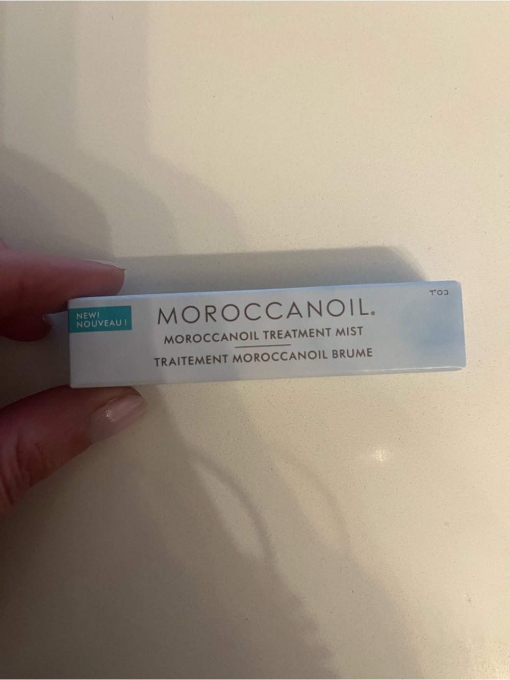 Moroccanoil Treatment Mist - White and Light Blue Packaging .17